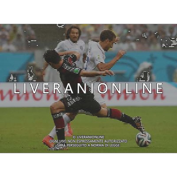 (140626) -- RECIFE, June 26, 2014 () -- Germany\'s Mats Hummels (L, front) vies with Fabian Johnson of the U.S. (R, front) during a Group G match between the U.S. and Germany of 2014 FIFA World Cup at the Arena Pernambuco Stadium in Recife, Brazil, on June 26, 2014.(/Guo Yong)(pcy) ©PHOTOHOT/Agenzia Aldo Liverani sas - ITALY ONLY - EDITORIAL USE ONLY