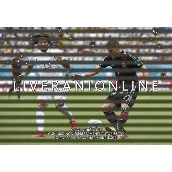 (140626) -- RECIFE, June 26, 2014 () -- Germany\'s Bastian Schweinsteiger (R) vies with Jermaine Jones of the U.S. during a Group G match between the U.S. and Germany of 2014 FIFA World Cup at the Arena Pernambuco Stadium in Recife, Brazil, on June 26, 2014.(/Lui Siu Wai)(pcy) ©PHOTOHOT/Agenzia Aldo Liverani sas - ITALY ONLY - EDITORIAL USE ONLY
