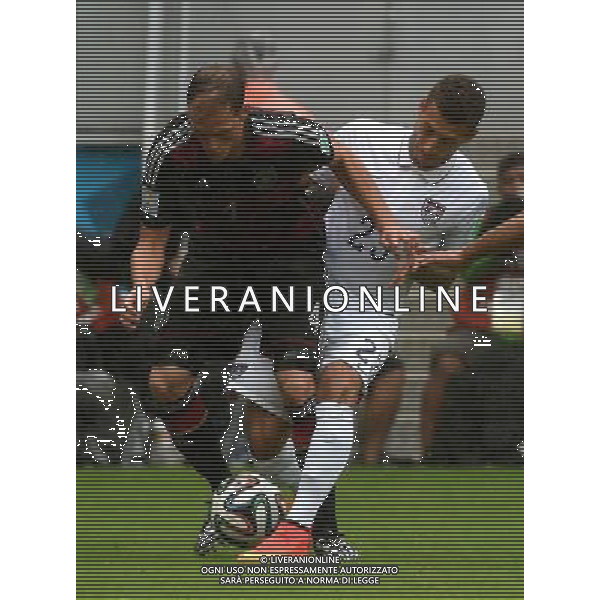 (140626) -- RECIFE, June 26, 2014 () -- Germany\'s Benedikt Howedes (L) vies with Fabian Johnson of the U.S. during a Group G match between the U.S. and Germany of 2014 FIFA World Cup at the Arena Pernambuco Stadium in Recife, Brazil, on June 26, 2014.(/Guo Yong)(pcy) ©PHOTOHOT/Agenzia Aldo Liverani sas - ITALY ONLY - EDITORIAL USE ONLY