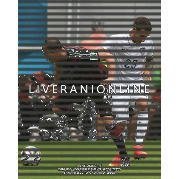 (140626) -- RECIFE, June 26, 2014 () -- Germany\'s Benedikt Howedes (L) vies with Fabian Johnson of the U.S. during a Group G match between the U.S. and Germany of 2014 FIFA World Cup at the Arena Pernambuco Stadium in Recife, Brazil, on June 26, 2014.(/Guo Yong)(pcy) ©PHOTOHOT/Agenzia Aldo Liverani sas - ITALY ONLY - EDITORIAL USE ONLY