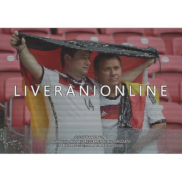 (140626) -- RECIFE, June 26, 2014 () -- Two supporters of Germany are seen before a Group G match between the U.S. and Germany of 2014 FIFA World Cup at the Arena Pernambuco Stadium in Recife, Brazil, on June 26, 2014.(/Guo Yong)(pcy) ©PHOTOHOT/Agenzia Aldo Liverani sas - ITALY ONLY - EDITORIAL USE ONLY