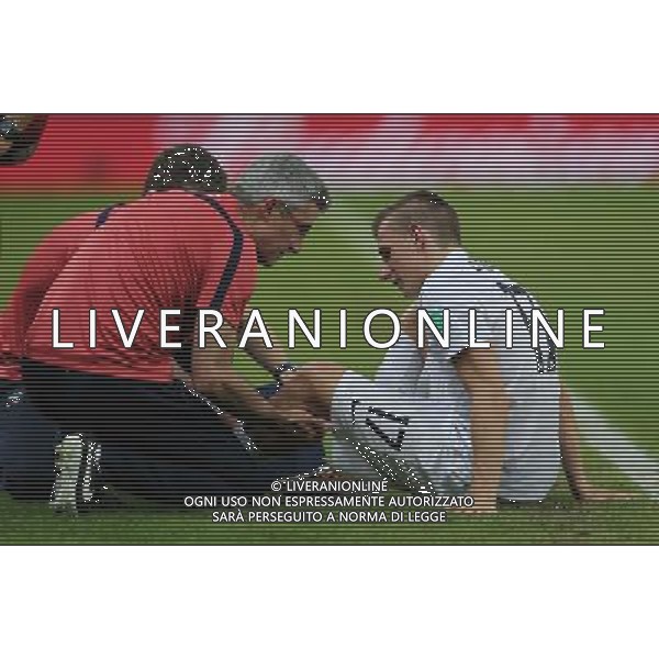 (140625) -- RIO DE JANEIRO, June 25, 2014 () -- France\'s Lucas Digne receives medical treatment after being hit during a Group E match between Ecuador and France of 2014 FIFA World Cup at the Estadio do Maracana Stadium in Rio de Janeiro, Brazil, June 25, 2014. The match ended in a 0-0 draw. (/Xu Zijian) ©PHOTOSHOT/Agenzia Aldo Liverani sas - ITALY ONLY - EDITORIAL USE ONLY