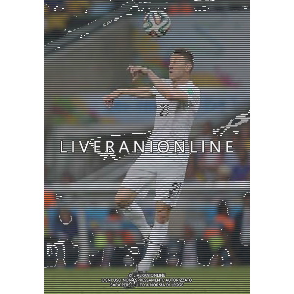 (140625) -- RIO DE JANEIRO, June 25, 2014 () -- France\'s Laurent Koscielny jumps for the ball during a Group E match between Ecuador and France of 2014 FIFA World Cup at the Estadio do Maracana Stadium in Rio de Janeiro, Brazil, June 25, 2014. The match ended in a 0-0 draw. (/Xu Zijian) ©PHOTOSHOT/Agenzia Aldo Liverani sas - ITALY ONLY - EDITORIAL USE ONLY