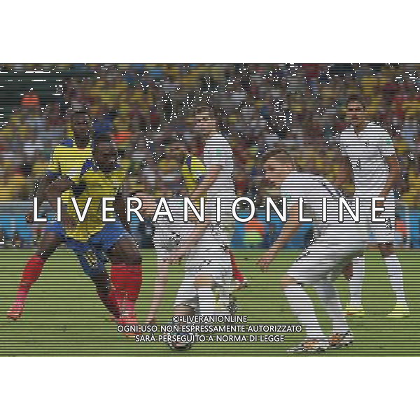 (140625) -- RIO DE JANEIRO, June 25, 2014 () -- France\'s Laurent Koscielny (C) vies for the ball during a Group E match between Ecuador and France of 2014 FIFA World Cup at the Estadio do Maracana Stadium in Rio de Janeiro, Brazil, June 25, 2014. The match ended in a 0-0 draw. (/Xu Zijian) ©PHOTOSHOT/Agenzia Aldo Liverani sas - ITALY ONLY - EDITORIAL USE ONLY