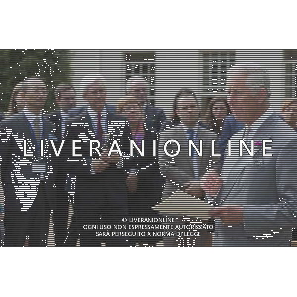 26 June 2014, London, UK. Prince Charles holds a speech. The Prince of Wales hosts a reception for supporters of Biomimetics in the gardens of Clarence House, London, UK. Biomimetics is the application of principles and concepts found in nature to help solve human problems. It has been widely hailed as the future of green innovation and is expected to represent $1trn of global GDP by 2025. Prince Charles met with Professor Andrew Parker, one of the world\'s leading experts in biomimetics and Alastair Lukies, CEO of Monitise. ©photoshot/Agenzia Aldo Liverani sas - ITALY ONLY - EDITORIAL USE ONLY - REALI INGLESI: Carlo Principe di Galles ospite ad un ricevimento per i sostenitori della Biomimetica a Clarence House, Londra, Inghilterra