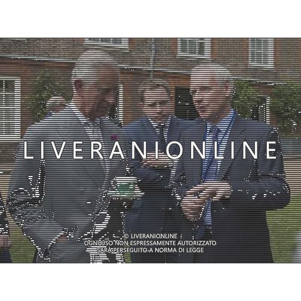 26 June 2014, London, UK. L-R: Prince Charles, Alastair Lukies and Professor Andrew Parker. The Prince of Wales hosts a reception for supporters of Biomimetics in the gardens of Clarence House, London, UK. Biomimetics is the application of principles and concepts found in nature to help solve human problems. It has been widely hailed as the future of green innovation and is expected to represent $1trn of global GDP by 2025. Prince Charles met with Professor Andrew Parker, one of the world\'s leading experts in biomimetics and Alastair Lukies, CEO of Monitise. ©photoshot/Agenzia Aldo Liverani sas - ITALY ONLY - EDITORIAL USE ONLY - REALI INGLESI: Carlo Principe di Galles ospite ad un ricevimento per i sostenitori della Biomimetica a Clarence House, Londra, Inghilterra