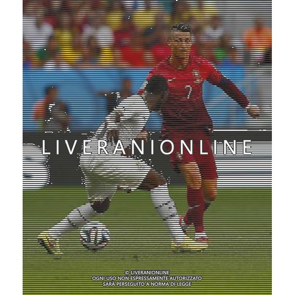 (140626) -- BRASILIA, June 26, 2014 () -- Portugal\'s Cristiano Ronaldo (R) vies for the ball during a Group G match between Portugal and Ghana of 2014 FIFA World Cup at the Estadio Nacional Stadium in Brasilia, Brazil, June 26, 2014. (/Liu Bin) ©photoshot/Agenzia Aldo Liverani sas - ITALY ONLY - EDITORIAL USE ONLY - PORTOGALLO GHANA CAMPIONATO DEL MONDO BRASILE 2014