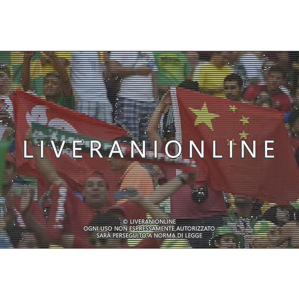 (140626) -- BRASILIA, June 26, 2014 () -- Football fans from China pose with China\'s national flag and the flag of south China\'s Hong Kong prior to a Group G match between Portugal and Ghana of 2014 FIFA World Cup at the Estadio Nacional Stadium in Brasilia, Brazil, June 26, 2014. (/Qi Heng)(xzj) ©photoshot/Agenzia Aldo Liverani sas - ITALY ONLY - EDITORIAL USE ONLY - PORTOGALLO GHANA CAMPIONATO DEL MONDO BRASILE 2014