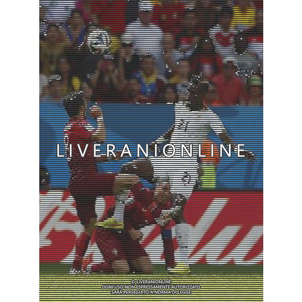 (140626) -- BRASILIA, June 26, 2014 () -- Portugal\'s Joao Moutinho vies with Ghana\'s John Boye during a Group G match between Portugal and Ghana of 2014 FIFA World Cup at the Estadio Nacional Stadium in Brasilia, Brazil, June 26, 2014. (/Liu Bin) ©photoshot/Agenzia Aldo Liverani sas - ITALY ONLY - EDITORIAL USE ONLY - PORTOGALLO GHANA CAMPIONATO DEL MONDO BRASILE 2014
