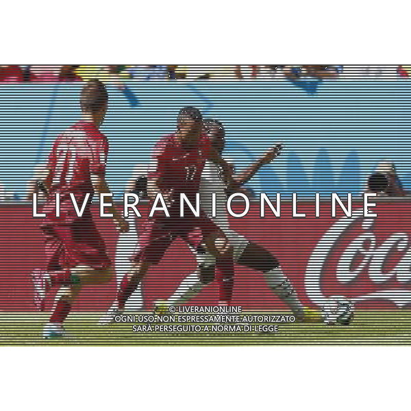 (140626) -- BRASILIA, June 26, 2014 () -- Portugal\'s Nani (C) vies for the ball during a Group G match between Portugal and Ghana of 2014 FIFA World Cup at the Estadio Nacional Stadium in Brasilia, Brazil, June 26, 2014. (/Liu Bin) ©photoshot/Agenzia Aldo Liverani sas - ITALY ONLY - EDITORIAL USE ONLY - PORTOGALLO GHANA CAMPIONATO DEL MONDO BRASILE 2014