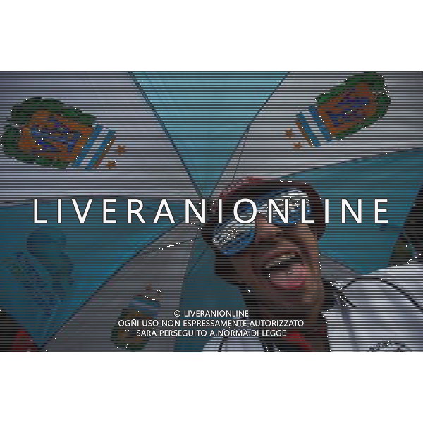 (140625) -- PORTO ALEGRE, June 25, 2014 () -- A supporter of Argentina poses before a Group F match between Argentina and Nigeria of 2014 FIFA World Cup in Porto Alegre, Brazil, June 25, 2014.(/Jhon Paz)(pcy) ©PHOTOSHOT/Agenzia Aldo Liverani sas - ITALY ONLY - EDITORIAL USE ONLY
