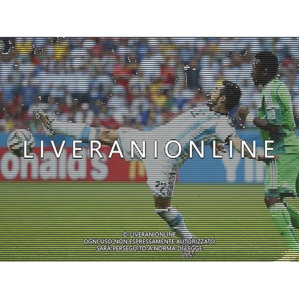 (140625) -- PORTO ALEGRE, June 25, 2014 () -- Argentina\'s Ezequiel Lavezzi (L) competes during a Group F match between Nigeria and Argentina of 2014 FIFA World Cup at the Estadio Beira-Rio Stadium in Porto Alegre, Brazil, on June 25, 2014. Argentina won 3-2 over Nigeria on Wednesday. (/Chen Jianli)(pcy) ©PHOTOSHOT/Agenzia Aldo Liverani sas - ITALY ONLY - EDITORIAL USE ONLY
