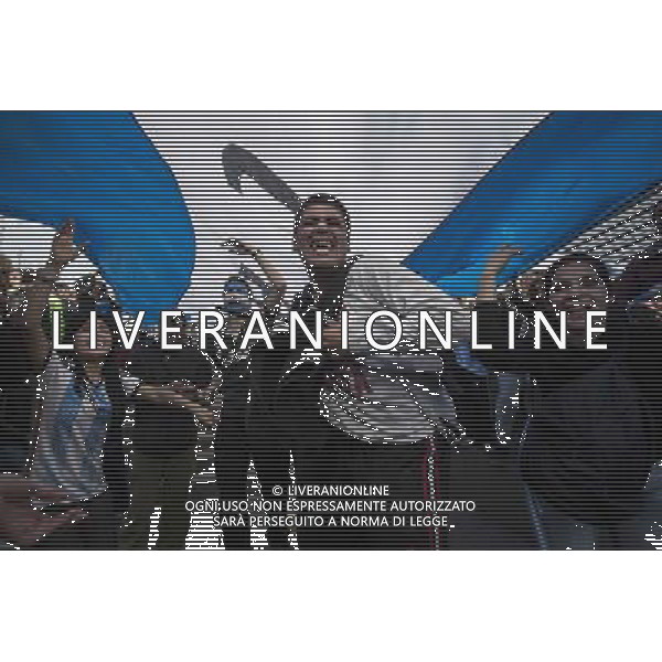 (140625) -- BUENOS AIRES, June 25, 2014 () -- Argentina\'s fans react while watching the broadcast of a Group F match between Argentina and Nigeria of 2014 FIFA World Cup on a screen installed in San Martin Square, Buenos Aires, Argentina, on June 25, 2014.(/Martin Zabala) (rh) ©PHOTOSHOT/Agenzia Aldo Liverani sas - ITALY ONLY - EDITORIAL USE ONLY