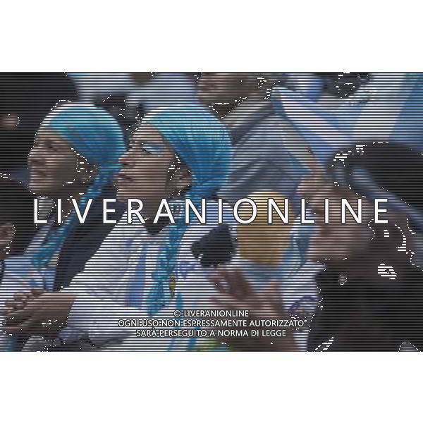 (140625) -- BUENOS AIRES, June 25, 2014 () -- Argentina\'s fans react while watching the broadcast of a Group F match between Argentina and Nigeria of 2014 FIFA World Cup on a screen installed in San Martin Square, Buenos Aires, Argentina, on June 25, 2014.(/Martin Zabala) (rh) ©PHOTOSHOT/Agenzia Aldo Liverani sas - ITALY ONLY - EDITORIAL USE ONLY