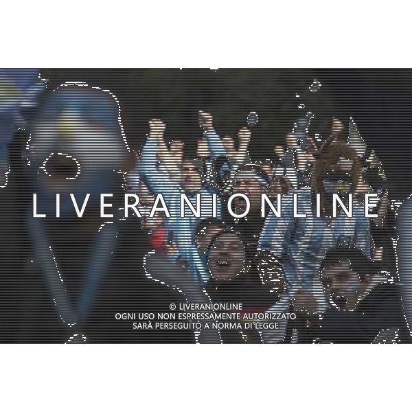 (140625) -- BUENOS AIRES, June 25, 2014 () -- Argentina\'s fans react while watching the broadcast of a Group F match between Argentina and Nigeria of 2014 FIFA World Cup on a screen installed in San Martin Square, Buenos Aires, Argentina, on June 25, 2014.(/Martin Zabala) (rh) ©PHOTOSHOT/Agenzia Aldo Liverani sas - ITALY ONLY - EDITORIAL USE ONLY