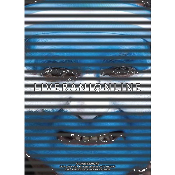 (140625) -- BUENOS AIRES, June 25, 2014 () -- An Argentina\'s fan reacts while watching the broadcast of a Group F match between Argentina and Nigeria of 2014 FIFA World Cup on a screen installed in San Martin Square, Buenos Aires, Argentina, on June 25, 2014.(/Martin Zabala) (rh) ©PHOTOSHOT/Agenzia Aldo Liverani sas - ITALY ONLY - EDITORIAL USE ONLY