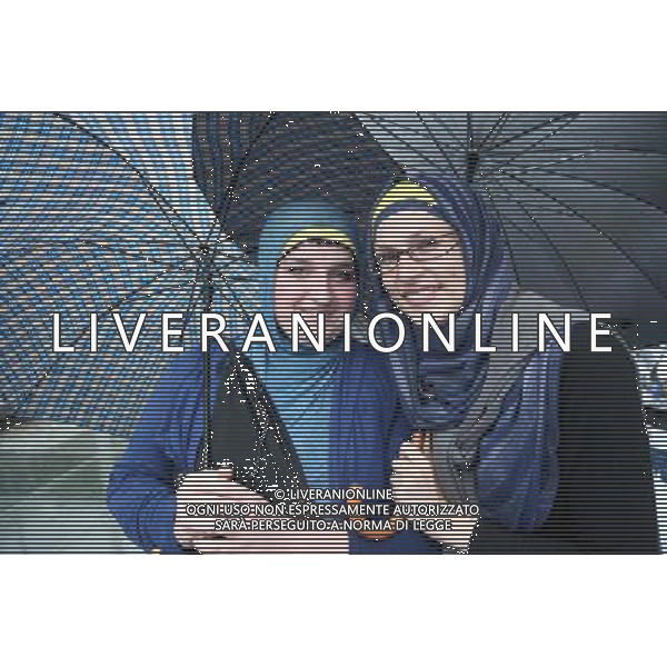 (140626) -- SARAJEVO, Jun. 26, 2014 () -- Fans cheer for the team as they watch the televised 2014 FIFA World Cup Group F match between Bosnia and Herzegovina and Iran, in front of the BBI Center at downtown Sarajevo, Bosnia Herzegovina, on June 25, 2014. Bosnia and Herzegovina won the match 3-1 but was disqualified for the knockout stage. (/Haris Memija) ©PHOTOSHOT/Agenzia Aldo Liverani sas - ITALY ONLY - EDITORIAL USE ONLY