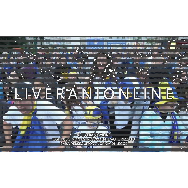 (140626) -- SARAJEVO, Jun. 26, 2014 () -- Fans cheer for the team as they watch the televised 2014 FIFA World Cup Group F match between Bosnia and Herzegovina and Iran, in front of the BBI Center at downtown Sarajevo, Bosnia Herzegovina, on June 25, 2014. Bosnia and Herzegovina won the match 3-1 but was disqualified for the knockout stage. (/Haris Memija) ©PHOTOSHOT/Agenzia Aldo Liverani sas - ITALY ONLY - EDITORIAL USE ONLY