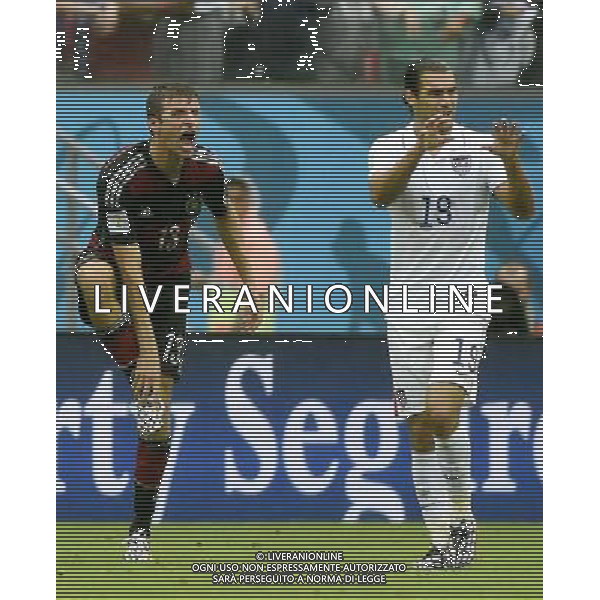 (140626) -- RECIFE, June 26, 2014 () -- Germany\'s Thomas Muller (L) and Graham Zusi of the U.S. (R) react during a Group G match between the U.S. and Germany of 2014 FIFA World Cup at the Arena Pernambuco Stadium in Recife, Brazil, on June 26, 2014.(/Lui Siu Wai)(pcy) ©photoshot/Agenzia Aldo Liverani sas - ITALY ONLY - EDITORIAL USE ONLY