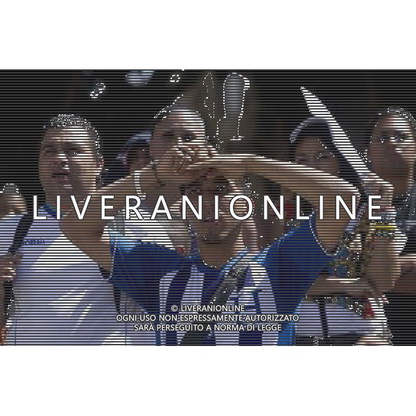 (140625) -- TEGUCIGALPA, June 25, 2014 () -- Supporters of Honduras react while watching the broadcast of a Group E match between Honduras and Switzerland of 2014 FIFA World Cup at the Central Park of Tegucigalpa, capital of Honduras, June 25, 2104. Switzerland won 3-0 over Honduras on Wednesday. (/Rafael Ochoa)(pcy) ©PHOTOSHOT/Agenzia Aldo Liverani sas - ITALY ONLY - EDITORIAL USE ONLY