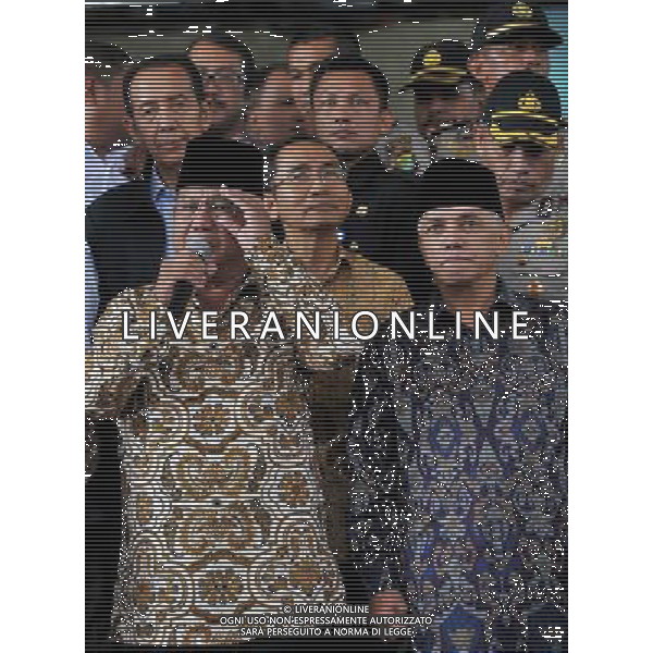 (140625) -- JAKARTA, June 25, 2014 (Xinhua) -- Indonesia presidential hopeful Prabowo Subianto (L, front) and his running mate Hatta Rajasa (R, front) attend a press conference after clarifying the reports of their assets previously given to the Indonesian Corruption Eradication Commission (KPK) in Jakarta, Indonesia, June 25, 2014. The KPK on Wednesday kicked off verification of wealth of presidential candidates as an effort to prevent graft. (Xinhua/Agung Kuncahya B.) ****Authorized by ytfs**** ©PHOTOSHOT/Agenzia Aldo Liverani sas - ITALY ONLY - EDITORIAL USE ONLY - Campagna elettorale dei candidati alle elezioni presidenziali a Jakarta, Indonesia, 26 giugno 2014
