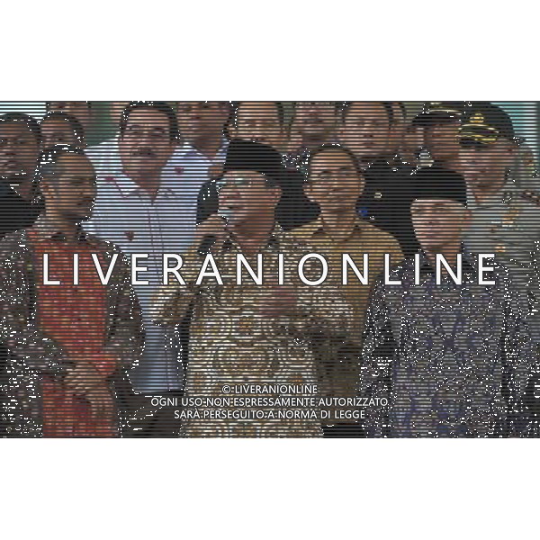 (140625) -- JAKARTA, June 25, 2014 (Xinhua) -- Indonesia presidential hopeful Prabowo Subianto (C, front) and his running mate Hatta Rajasa (R, front) attend a press conference after clarifying the reports of their assets previously given to the Indonesian Corruption Eradication Commission (KPK) in Jakarta, Indonesia, June 25, 2014. The KPK on Wednesday kicked off verification of wealth of presidential candidates as an effort to prevent graft. (Xinhua/Agung Kuncahya B.) ****Authorized by ytfs**** ©PHOTOSHOT/Agenzia Aldo Liverani sas - ITALY ONLY - EDITORIAL USE ONLY - Campagna elettorale dei candidati alle elezioni presidenziali a Jakarta, Indonesia, 26 giugno 2014