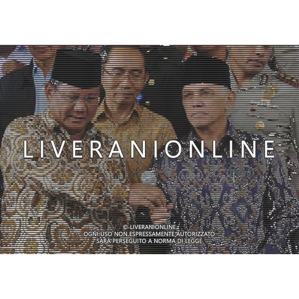 (140625) -- JAKARTA, June 25, 2014 (Xinhua) -- Indonesia presidential hopeful Prabowo Subianto (L, front) and his running mate Hatta Rajasa (R, front) attend a press conference after clarifying the reports of their assets previously given to the Indonesian Corruption Eradication Commission (KPK) in Jakarta, Indonesia, June 25, 2014. The KPK on Wednesday kicked off verification of wealth of presidential candidates as an effort to prevent graft. (Xinhua/Agung Kuncahya B.) ****Authorized by ytfs**** ©PHOTOSHOT/Agenzia Aldo Liverani sas - ITALY ONLY - EDITORIAL USE ONLY - Campagna elettorale dei candidati alle elezioni presidenziali a Jakarta, Indonesia, 26 giugno 2014