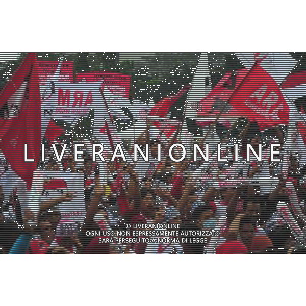 (140626) -- JAKARTA, June 26, 2014 () -- Supporters of Indonesia\'s presidential candidate Joko Widodo attend a campaign in Jakarta, Indonesia, June 26, 2014. Indonesia will hold presidential polls on July 9. (/Zulkarnain) ©PHOTOHOT/Agenzia Aldo Liverani sas - ITALY ONLY - EDITORIAL USE ONLY - Campagna elettorale dei candidati alle elezioni presidenziali a Jakarta, Indonesia, 26 giugno 2014