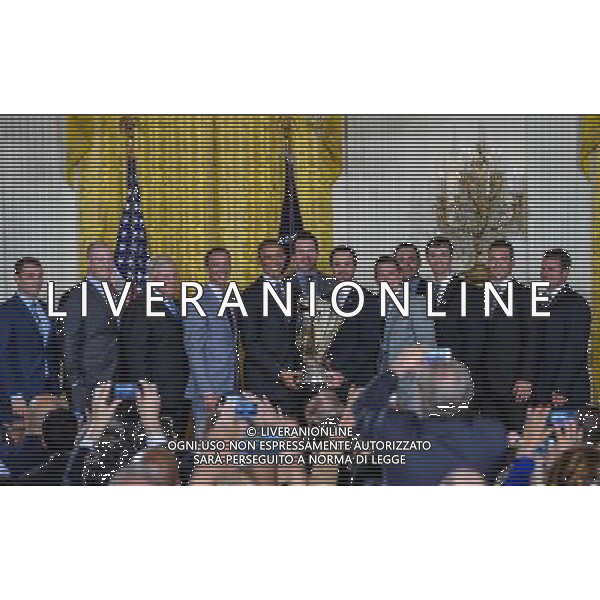 (140626) -- WASHINGTON, June 26, 2014 () -- U.S. President Barack Obama (5th L) poses with Jimmie Johnson (6th R) and the Hendrick Motorsports team members and honors their 2013 NASCAR Sprint Cup Series Championship at the White House in Washington June 25, 2014. (/Bao Dandan) ©PHOTOHOT/Agenzia Aldo Liverani sas - ITALY ONLY - EDITORIAL USE ONLY