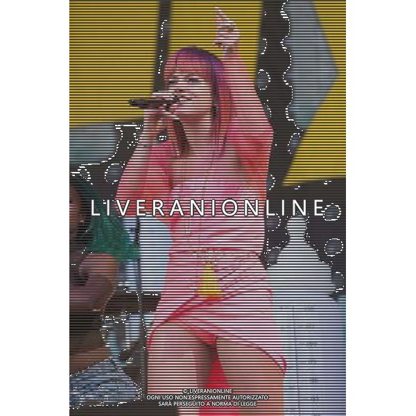 Lily Allen (born Lily Rose Allen) performs at Glastonbury Festival 2014, Worthy Farm, Pilton, Somerset, UK on Friday 27th June 2014. The Pyramid and Other Stages were closed and power shut whilst a lightning storm struck the festival. AG ALDO LIVERANI SAS ONLY ITALY
