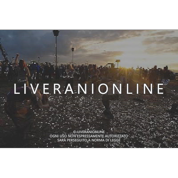 Pilton, UK, 27/06/2014 : Atmosphere at Glastonbury Festival. Dancing in the mud as the sun goes down at Arcadia. ©PHOTOSHOT/Agenzia Aldo Liverani sas - ITALY ONLY - EDITORIAL USE ONLY
