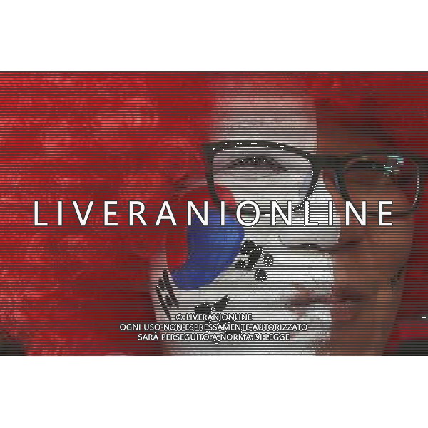 (140626) -- SAO PAULO, June 26, 2014 () -- A supporter of Korea Republic poses while waiting for a train to the Arena Sao Paulo Stadium where a Group H match between Belgium and Korea Republic of 2014 FIFA World Cup is held, in Sao Paulo, Brazil, June 26, 2014.(/Rahel Patrasso)(pcy) ©PHOTOSHOT/Agenzia Aldo Liverani sas - ITALY ONLY - EDITORIAL USE ONLY - Corea del Sud Vs Belgio Coppa del Mondo 2014 partita del Gruppo H FIFA World Cup 2014 allo Stadio Arena di Sao Paulo, in Brasile, il 26 giugno 2014