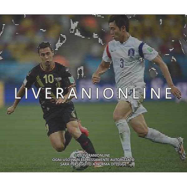 (140626) -- SAO PAULO, June 26, 2014 () -- Belgium\'s Eden Hazard (L) vies with Korea Republic\'s Yun Suk Young during a Group H match between Korea Republic and Belgium of 2014 FIFA World Cup at the Arena de Sao Paulo Stadium in Sao Paulo, Brazil, on June 26, 2014. Belgium won 1-0 over Korea Republic on Thursday. Belgium and Algeria enter Round of 16 from Group H. (/Li Ga)(pcy) ©PHOTOSHOT/Agenzia Aldo Liverani sas - ITALY ONLY - EDITORIAL USE ONLY - Corea del Sud Vs Belgio Coppa del Mondo 2014 partita del Gruppo H FIFA World Cup 2014 allo Stadio Arena di Sao Paulo, in Brasile, il 26 giugno 2014