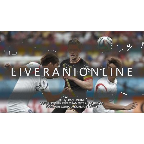 (140626) -- SAO PAULO, June 26, 2014 () -- Belgium\'s Jan Vertonghen (C) vies with Korea Republic\'s Hong Jeong Ho (L) and Lee Yong during a Group H match between Korea Republic and Belgium of 2014 FIFA World Cup at the Arena de Sao Paulo Stadium in Sao Paulo, Brazil, on June 26, 2014. Belgium won 1-0 over Korea Republic on Thursday. Belgium and Algeria enter Round of 16 from Group H. (/Li Ga)(pcy) ©PHOTOSHOT/Agenzia Aldo Liverani sas - ITALY ONLY - EDITORIAL USE ONLY - Corea del Sud Vs Belgio Coppa del Mondo 2014 partita del Gruppo H FIFA World Cup 2014 allo Stadio Arena di Sao Paulo, in Brasile, il 26 giugno 2014