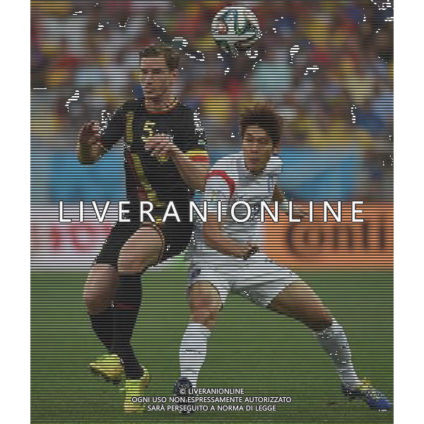 (140626) -- SAO PAULO, June 26, 2014 () -- Belgium\'s Jan Vertonghen (L) vies with Korea Republic\'s Lee Yong during a Group H match between Korea Republic and Belgium of 2014 FIFA World Cup at the Arena de Sao Paulo Stadium in Sao Paulo, Brazil, on June 26, 2014. Belgium won 1-0 over Korea Republic on Thursday. Belgium and Algeria enter Round of 16 from Group H. (/Li Ga)(pcy) ©PHOTOSHOT/Agenzia Aldo Liverani sas - ITALY ONLY - EDITORIAL USE ONLY - Corea del Sud Vs Belgio Coppa del Mondo 2014 partita del Gruppo H FIFA World Cup 2014 allo Stadio Arena di Sao Paulo, in Brasile, il 26 giugno 2014