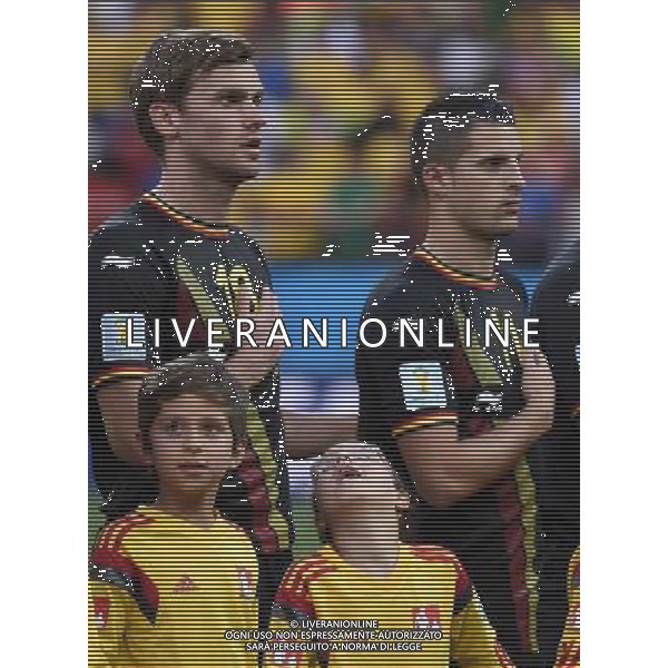 (140626) -- SAO PAULO, June 26, 2014 () -- A player escort (2nd L, front) looks at Belgium\'s Nicolas Lombaerts (L, back) before a Group H match between Korea Republic and Belgium of 2014 FIFA World Cup at the Arena de Sao Paulo Stadium in Sao Paulo, Brazil, on June 26, 2014. Belgium won 1-0 over Korea Republic on Thursday. Belgium and Algeria enter Round of 16 from Group H. (/Li Ga)(pcy) ©PHOTOSHOT/Agenzia Aldo Liverani sas - ITALY ONLY - EDITORIAL USE ONLY - Corea del Sud Vs Belgio Coppa del Mondo 2014 partita del Gruppo H FIFA World Cup 2014 allo Stadio Arena di Sao Paulo, in Brasile, il 26 giugno 2014