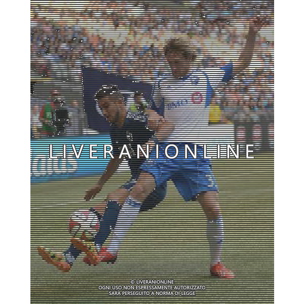 Vancouver Whitecaps\' Sebastian Fernandez (L) vies with Montreal Impact\' Gorka Larrea during their MLS soccer match at BC Place in Vancouver, Canada, on June 25, 2014. Vancouver Whitecaps 0-0 draw with the Montreal Impact. ©PHOTOSHOT/Agenzia Aldo Liverani sas - ITALY ONLY - EDITORIAL USE ONLY