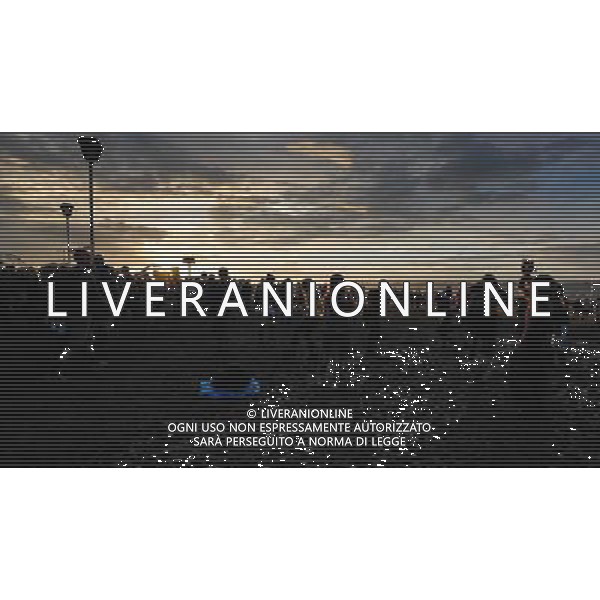 Pilton, UK, 27/06/2014 : Atmosphere at Glastonbury Festival. Dancing in the mud as the sun goes down at Arcadia. AG ALDO LIVERANI SAS ONLY ITALY