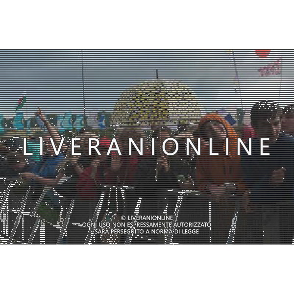 Festival goers wait in the rain for Foster The People to come onstage at Glastonbury Festival 2014, Worthy Farm, Pilton, Somerset, UK on Friday 27th June 2014. The Pyramid and Other Stages were closed and power shut whilst a lightning storm struck the festival. AG ALDO LIVERANI SAS ONLY ITALY