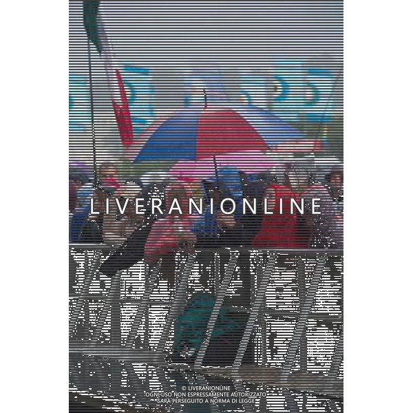 Festival goers wait in the rain for Foster The People to come onstage at Glastonbury Festival 2014, Worthy Farm, Pilton, Somerset, UK on Friday 27th June 2014. The Pyramid and Other Stages were closed and power shut whilst a lightning storm struck the festival. AG ALDO LIVERANI SAS ONLY ITALY
