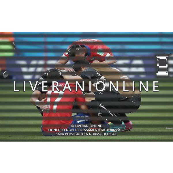 (140628) -- BELO HORIZONTE, June 28, 2014 () -- Chile\'s players react after the penalty shoot-out of a Round of 16 match between Brazil and Chile of 2014 FIFA World Cup at the Estadio Mineirao Stadium in Belo Horizonte, Brazil, on June 28, 2014. Brazil won 4-3 (3-2 in penalties) over Chile and qualified for Quarter-finals on Saturday.(/Liu Dawei)(rh) AG ALDO LIVERANI SAS ONLY ITALY