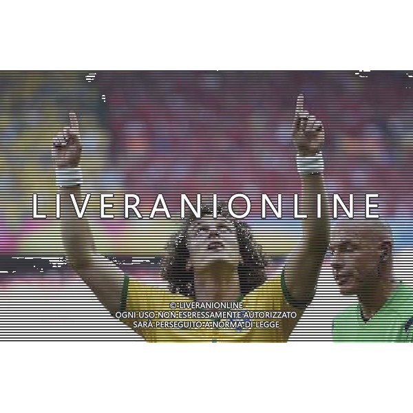 (140628) -- BELO HORIZONTE, June 28, 2014 () -- Brazil\'s David Luiz (L) celebrates a goal during a Round of 16 match between Brazil and Chile of 2014 FIFA World Cup at the Estadio Mineirao Stadium in Belo Horizonte, Brazil, on June 28, 2014.(/Qi Heng)(pcy) AG ALDO LIVERANI SAS ONLY ITALY