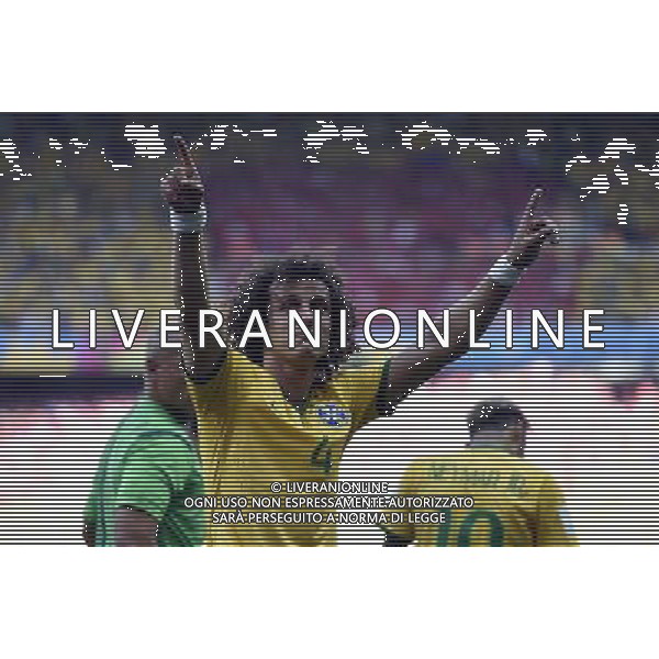 (140628) -- BELO HORIZONTE, June 28, 2014 () -- Brazil\'s David Luiz celebrates his goal during a Round of 16 match between Brazil and Chile of 2014 FIFA World Cup at the Estadio Mineirao Stadium in Belo Horizonte, Brazil, on June 28, 2014.(/Qi Heng)(pcy) AG ALDO LIVERANI SAS ONLY ITALY
