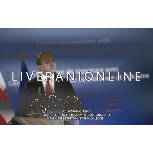 (140627) -- BRUSSELS, June 27, 2014 () -- Georgian Prime Minister Irakli Garibashvili speaks during the signing ceremony, in Brussels, Belgium, June 27, 2014. The European Union (EU) signed the Association Agreements with Ukraine, Georgia and Moldova on Friday with the aim of deepening political and economic ties with the three former Soviet republics(/The Council of the European Union) (lyi) *NO COMMERCIAL USE* AG ALDO LIVERANI SAS ONLY ITALY