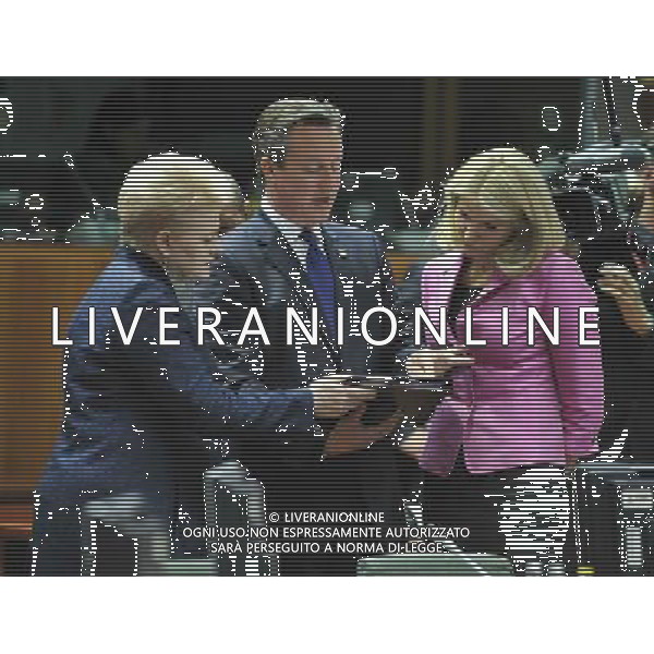 (140627) -- BRUSSELS, June 27, 2014 () -- Lithuanian President Dalia Grybauskaite (L), British Prime Minister David Cameron (C) and Danish Prime Minister Helle Thorning-Schmidt talk before the start of a working session during the second day of the EU Summit at its headquarters in Brussels, Belgium, June 27, 2014. (/Ye Pingfan) AG ALDO LIVERANI SAS ONLY ITALY