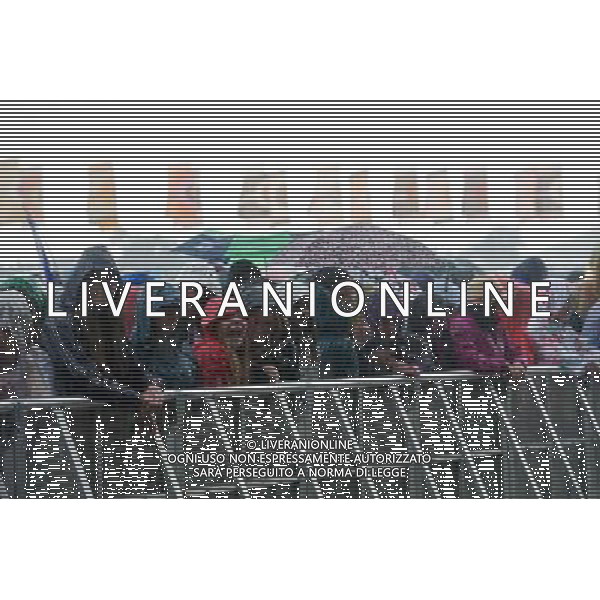 Festival goers wait in the rain for Foster The People to come onstage at Glastonbury Festival 2014, Worthy Farm, Pilton, Somerset, UK on Friday 27th June 2014. The Pyramid and Other Stages were closed and power shut whilst a lightning storm struck the festival. AG ALDO LIVERANI SAS ONLY ITALY