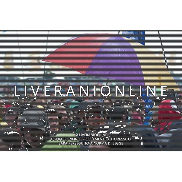 Festival goers wait in the rain for Foster The People to come onstage at Glastonbury Festival 2014, Worthy Farm, Pilton, Somerset, UK on Friday 27th June 2014. The Pyramid and Other Stages were closed and power shut whilst a lightning storm struck the festival. AG ALDO LIVERANI SAS ONLY ITALY