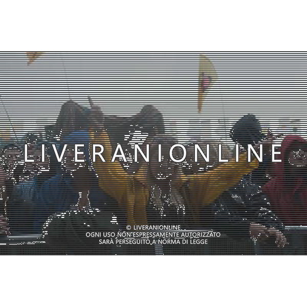 Festival goers wait in the rain for Foster The People to come onstage at Glastonbury Festival 2014, Worthy Farm, Pilton, Somerset, UK on Friday 27th June 2014. The Pyramid and Other Stages were closed and power shut whilst a lightning storm struck the festival. AG ALDO LIVERANI SAS ONLY ITALY