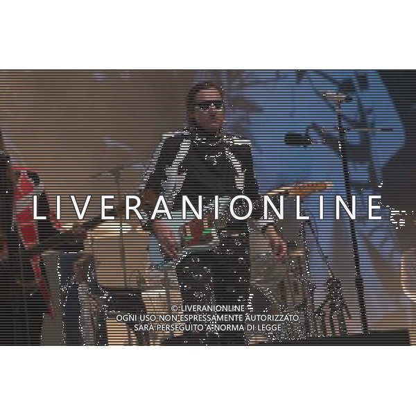 Canadian band Arcade Fire performing at Glastonbury Festival 2014, Worthy Farm, Pilton, Somerset, UK on Friday 27th June 2014. The Pyramid and Other Stages were closed and power shut whilst a lightning storm struck the festival. AG ALDO LIVERANI SAS ONLY ITALY