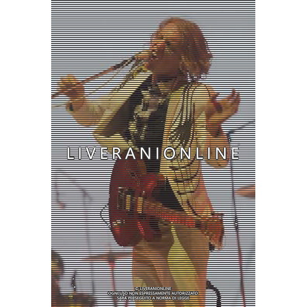Canadian band Arcade Fire performing at Glastonbury Festival 2014, Worthy Farm, Pilton, Somerset, UK on Friday 27th June 2014. The Pyramid and Other Stages were closed and power shut whilst a lightning storm struck the festival. AG ALDO LIVERANI SAS ONLY ITALY